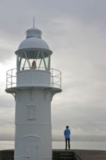 Photo of Steph and lighthouse, © by Harry Griswold